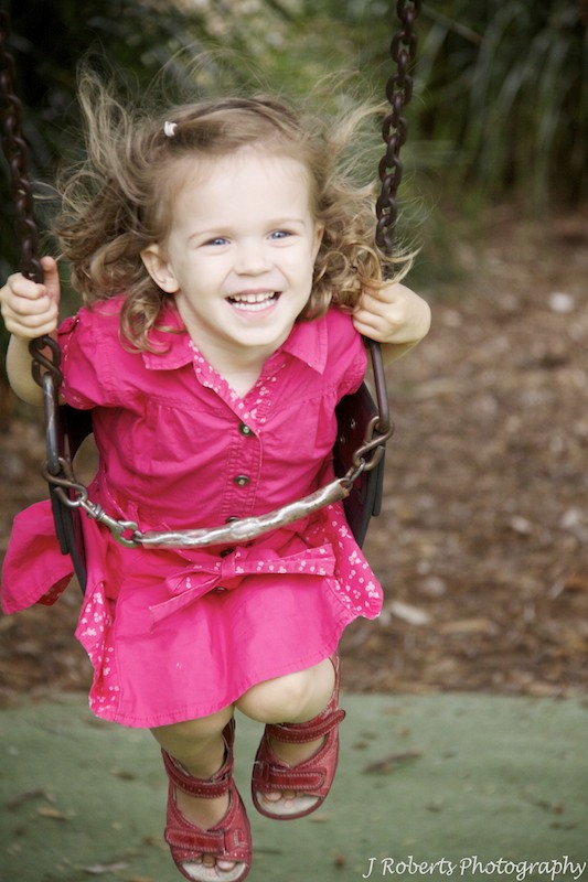 Toddler on the swings - family portrait photography sydney